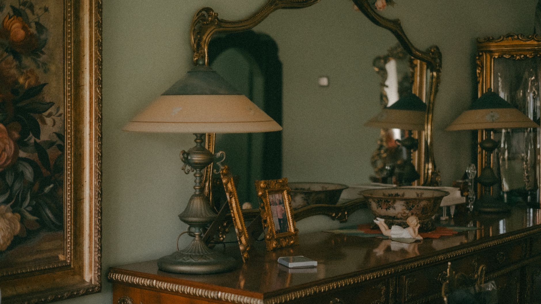 Brass Swing-Arm Lamp: vintage table lamp glowing in a room